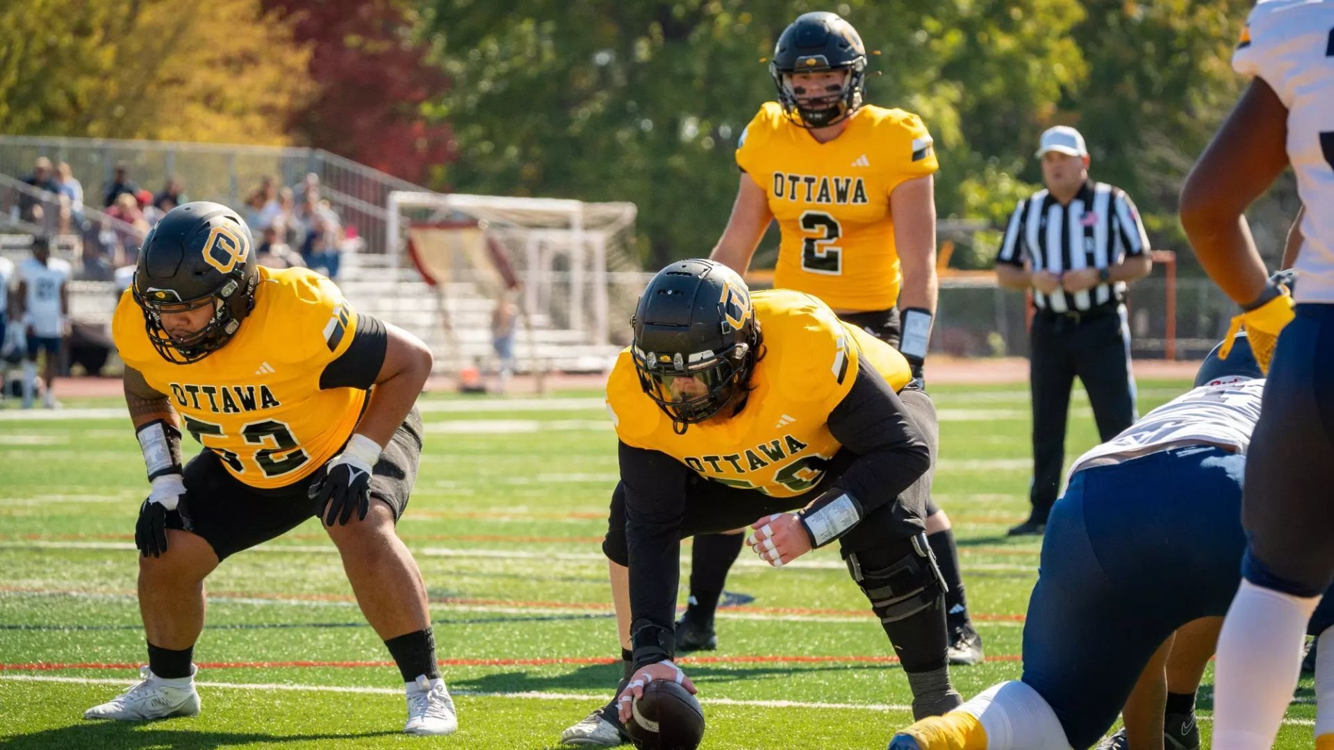 ottawa university football players yellow